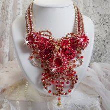 Ruby necklace embroidered with red agate and semi-precious coral beads Haute-Couture style